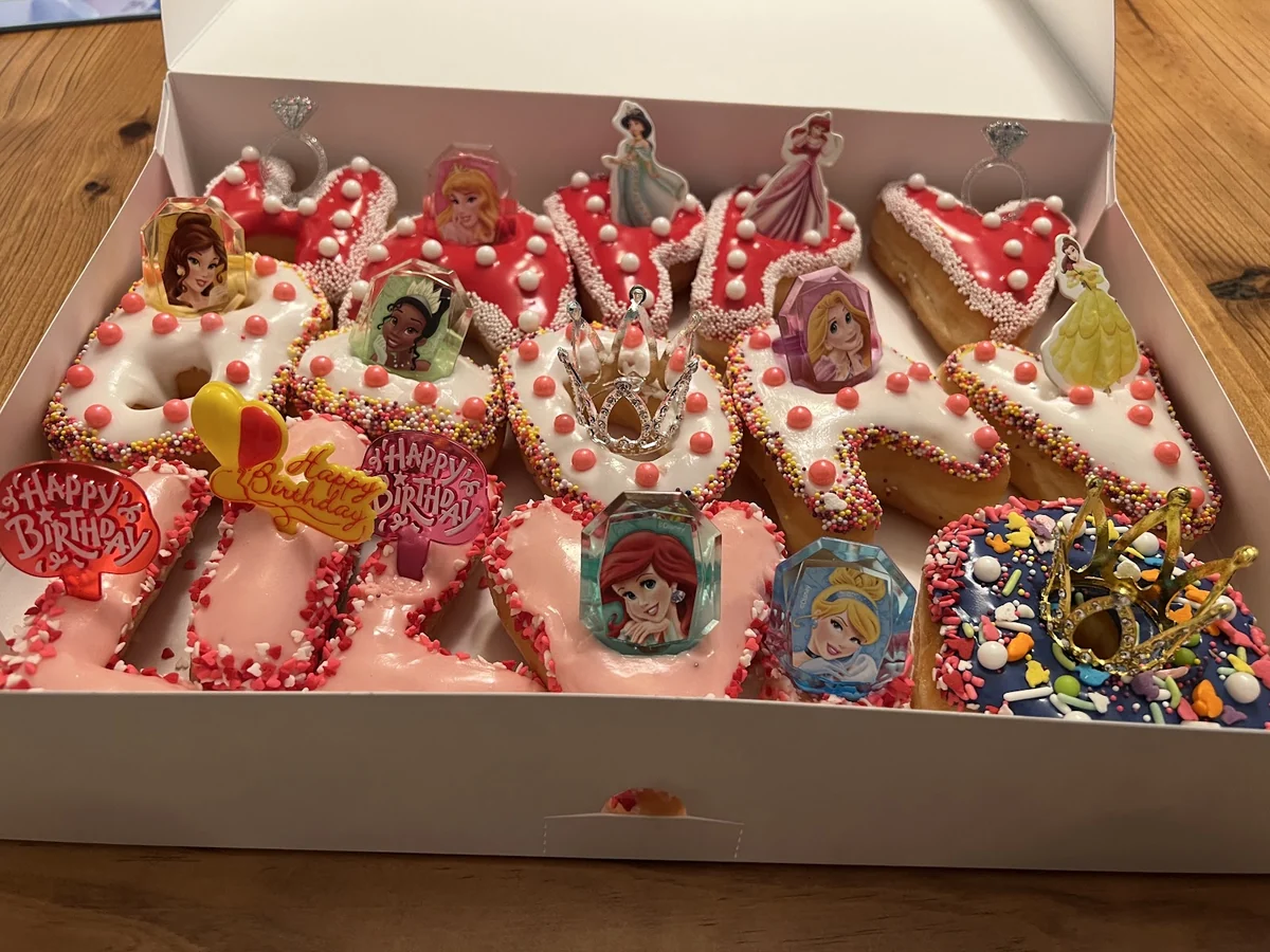Custom Happy Birthday letter donuts decorated with princess characters