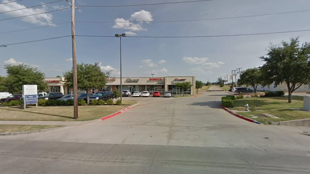 Sublett Doughnuts storefront in the strip center on W Sublett Road